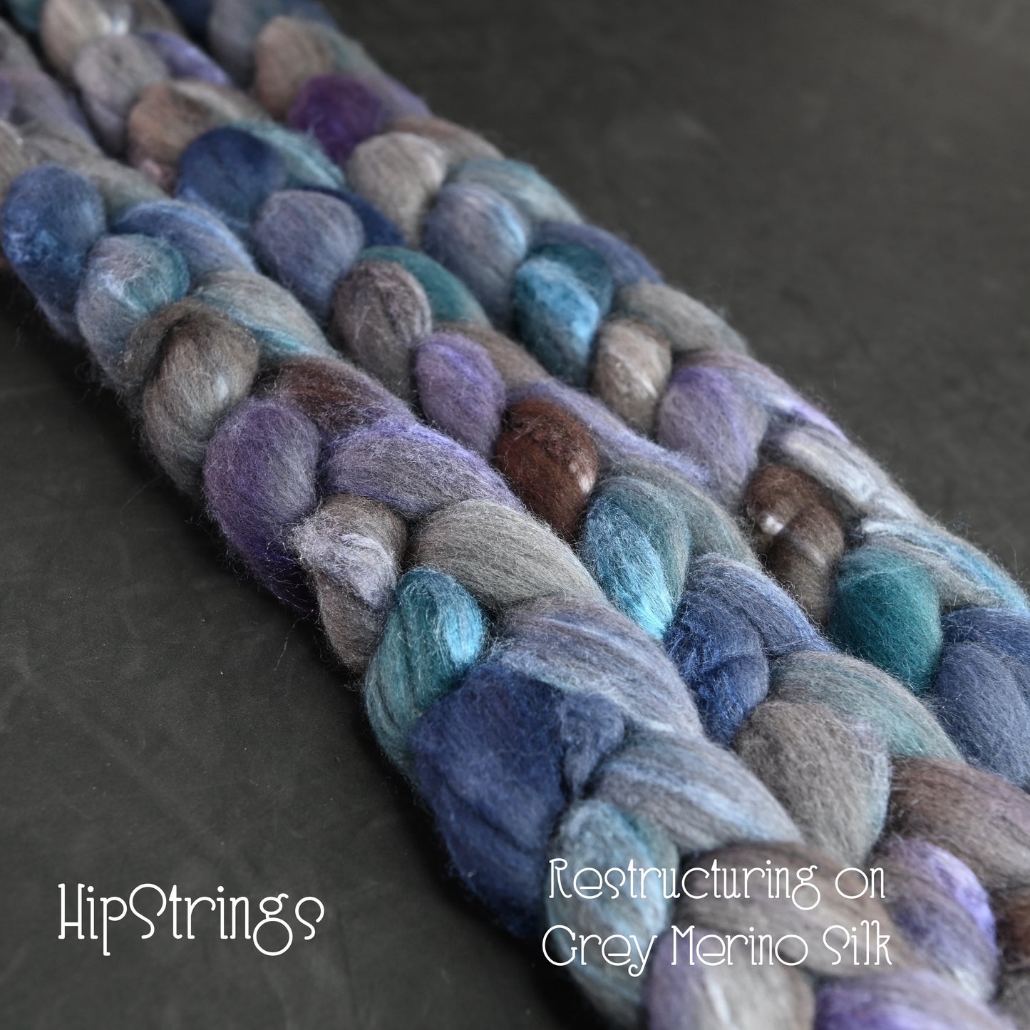 Restructuring on Hand Dyed Grey Merino/Tussah Silk Combed Top 4 oz
