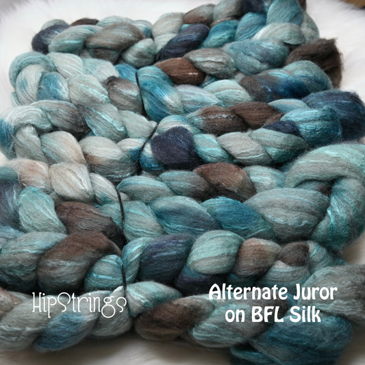 Alternate Juror on Hand Dyed 85/15 Blue Faced Leicester Tussah Silk Combed Wool Top 4 oz