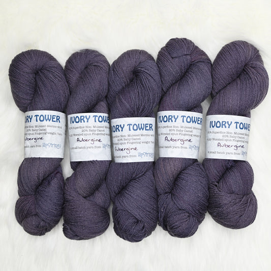 Aubergine on Hand Dyed Ivory Tower Superfine Merino and Baby Camel Fingering Weight Yarn - 437 yd/100g