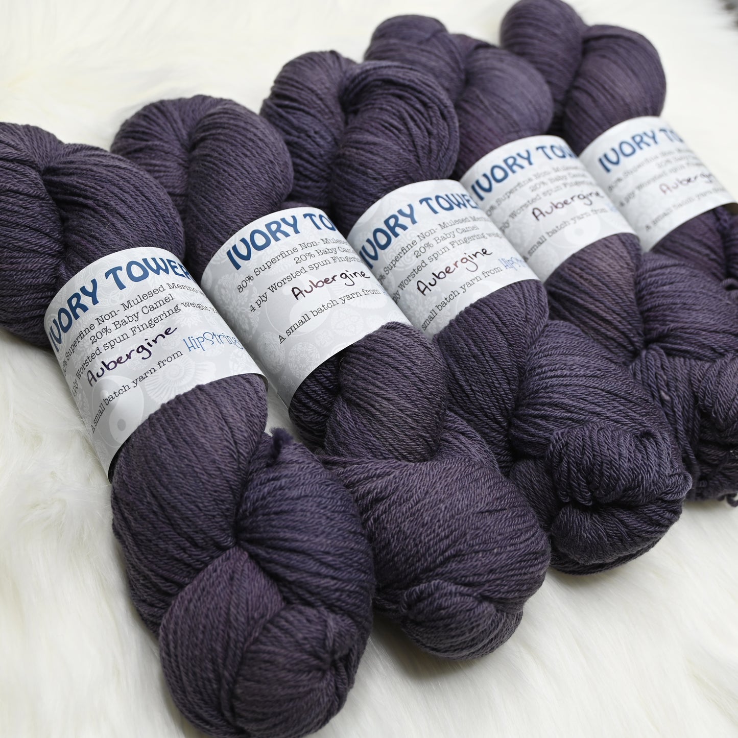 Aubergine on Hand Dyed Ivory Tower Superfine Merino and Baby Camel Fingering Weight Yarn - 437 yd/100g