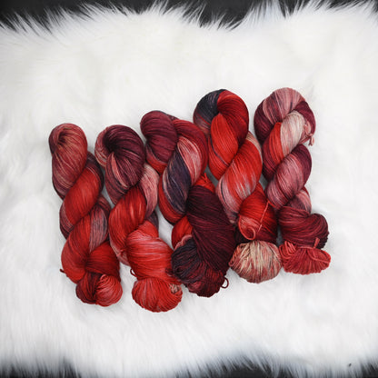 Strawberry Rhubarb on Hand Dyed SW Targhee Wool Nylon Sock Yarn - 465 yd/115 g