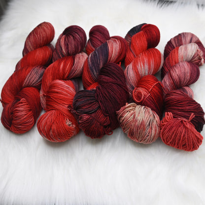 Strawberry Rhubarb on Hand Dyed SW Targhee Wool Nylon Sock Yarn - 465 yd/115 g